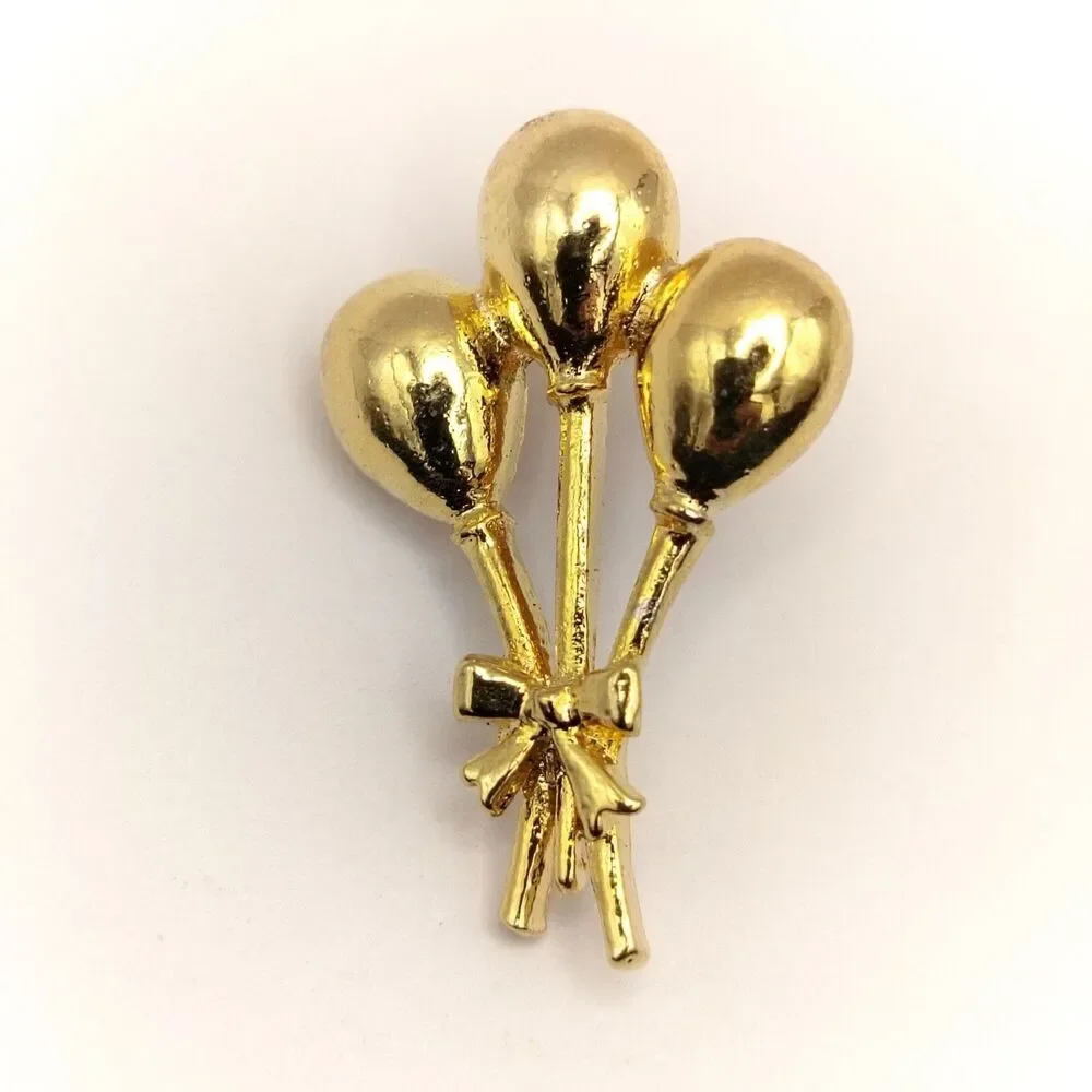 None brooch pin